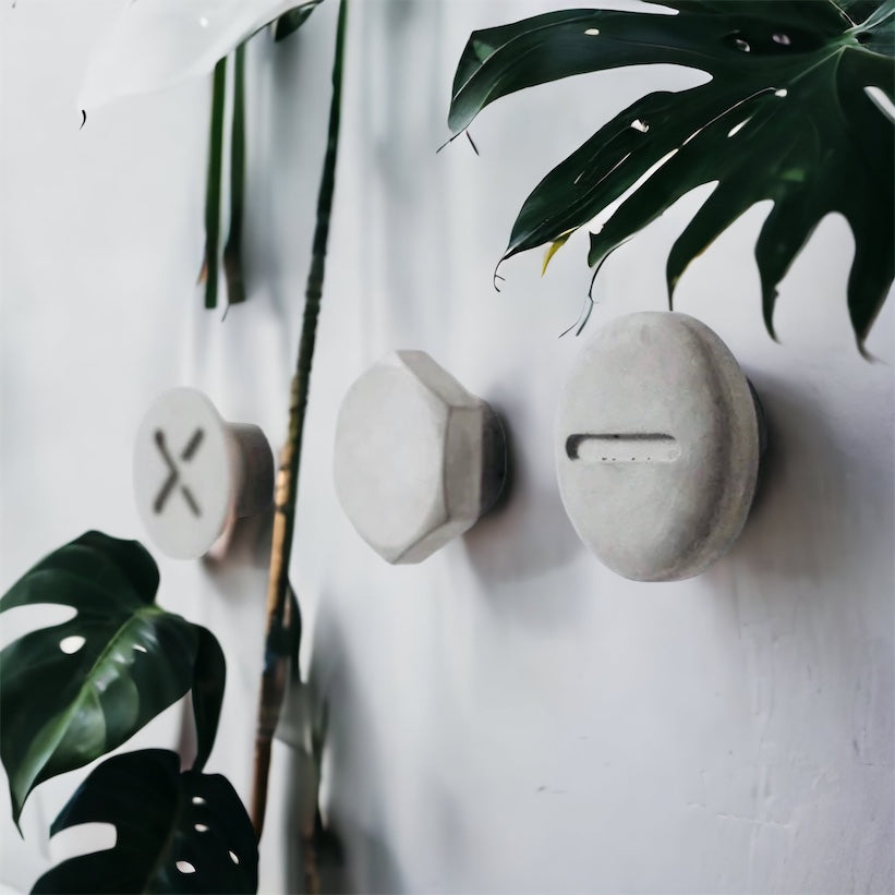 Screwed-Up Concrete Wall Hooks