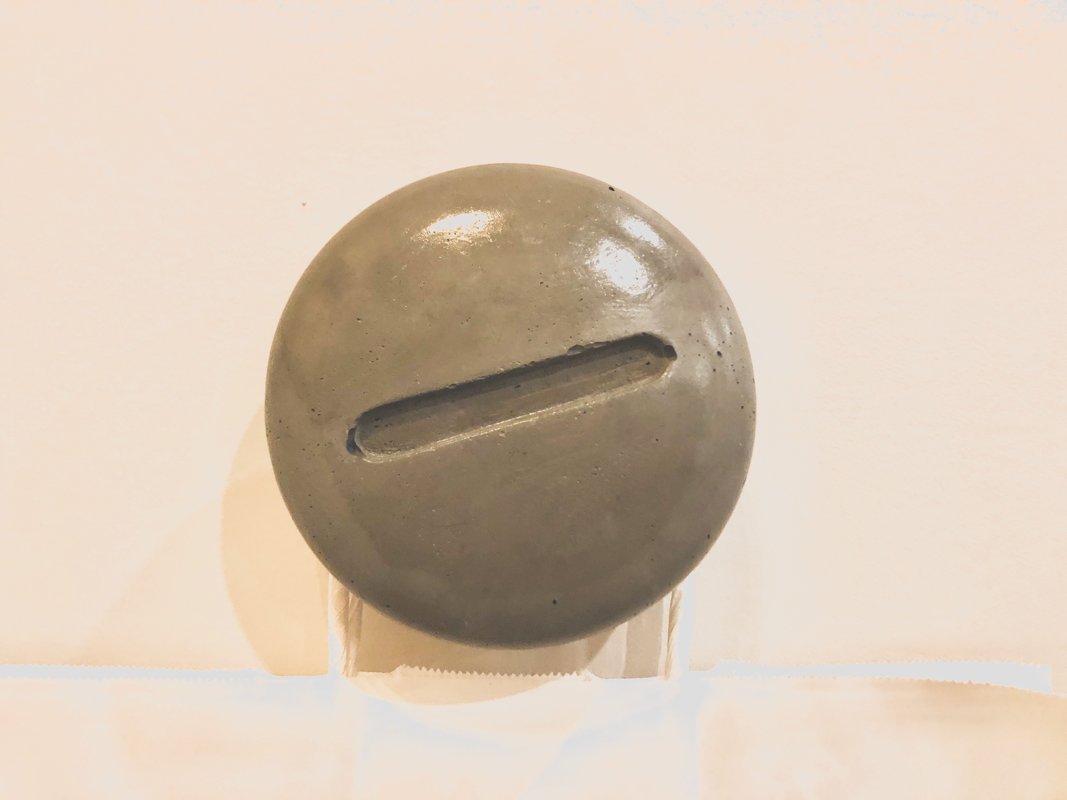 Screwed-Up Concrete Wall Hooks