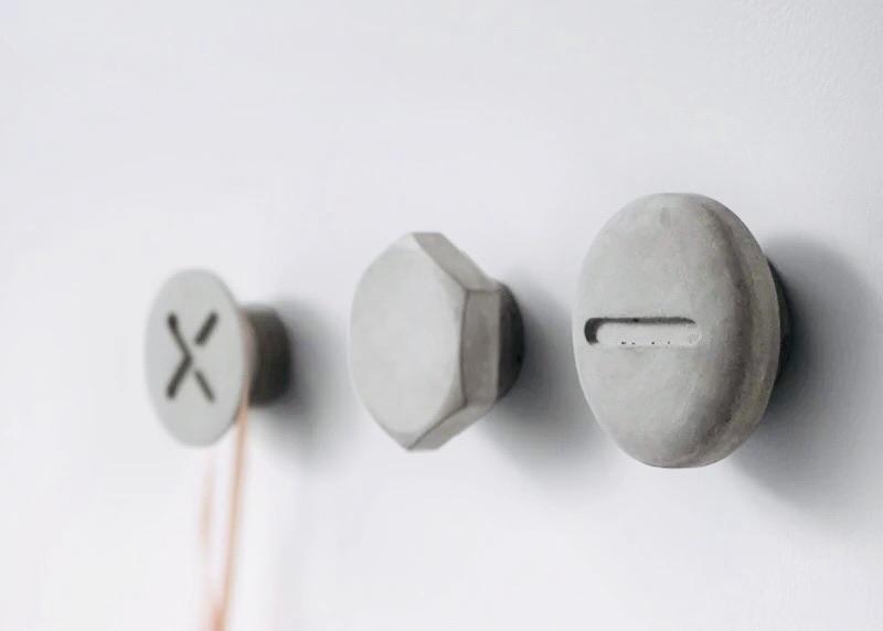 Screwed-Up Concrete Wall Hooks